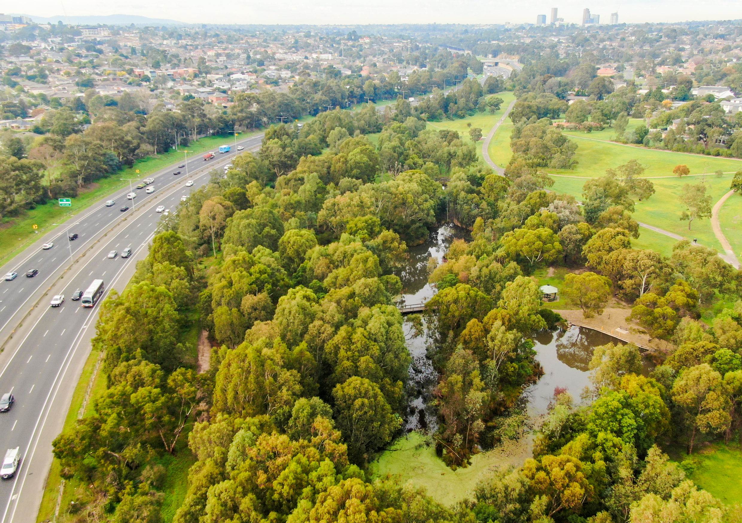 An aerial view of the Eastern Freeway with the Freeway golf course alongside it