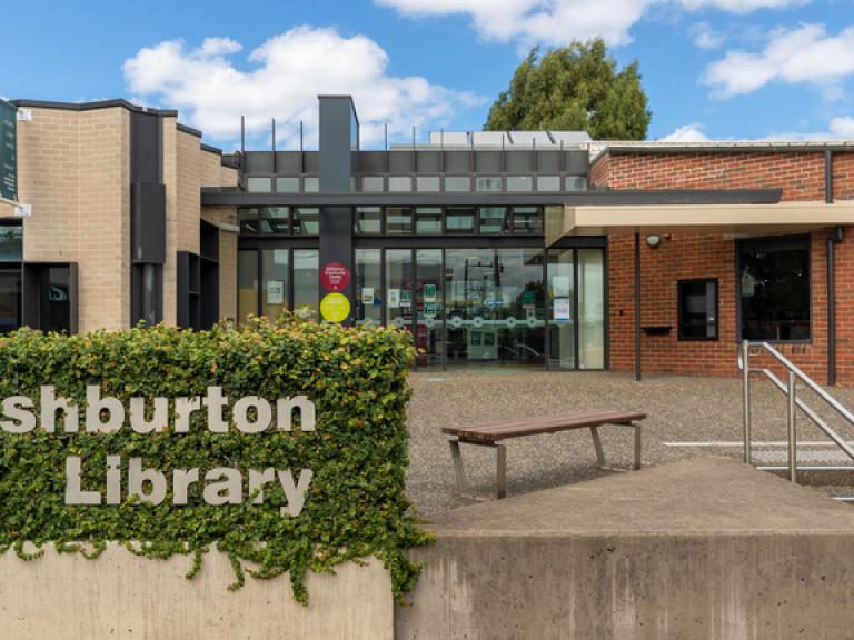 Exterior of Ashburton Library including stairs and brick facade