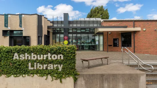 Exterior of Ashburton Library including stairs and brick facade