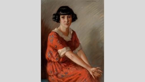 A pastel on paper artwork of a seated woman. She has a short curly black bob and a fringe, and wide brown eyes. She is wearing a red short-sleeved dress, covered in a repeating blue diamond pattern, with a white collar and cuffs. She is clasping her hands together and looking directly at the painter.