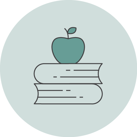 Stack of books with an apple on top