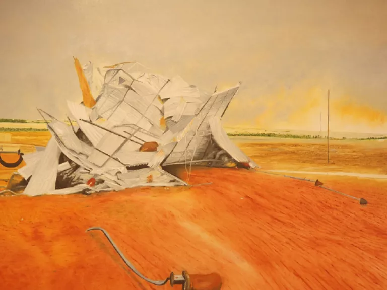 An artwork of a desert landscape featuring a large collapsed structure of corrogated iron on the red dirt