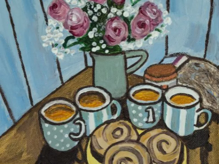 Painting of a kitchen table. The table features pink roses in a vase, four mugs of tea, a plate of pastries, a bowl of pistachios, and a smaller bowl for the pistachio shells.