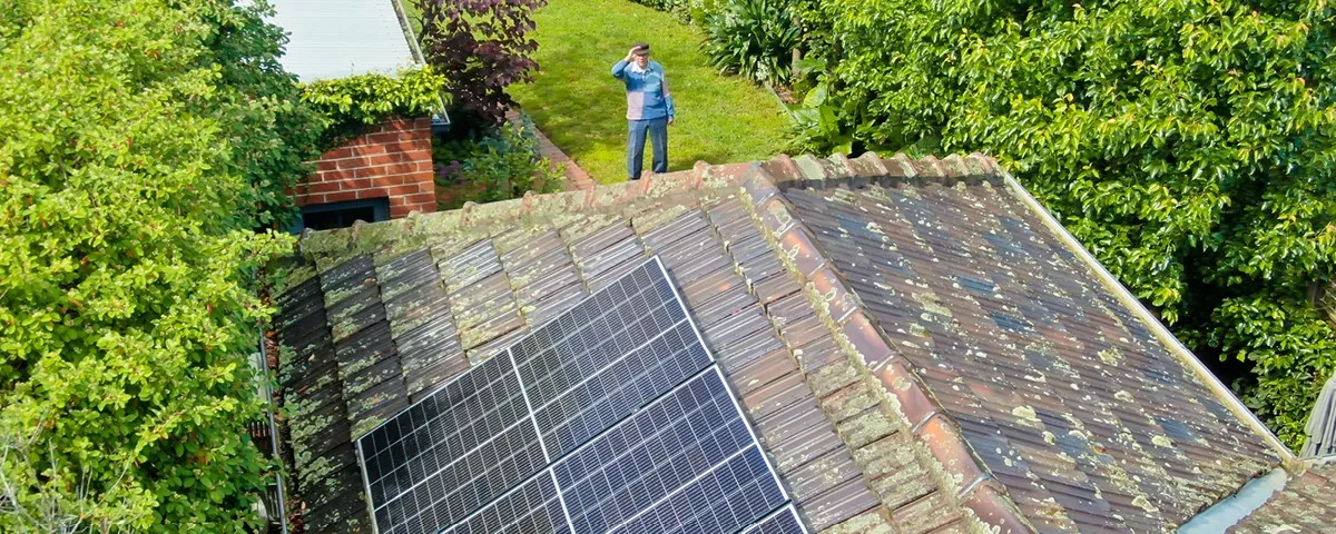 Overhead photo showing solar panels on a roof and 