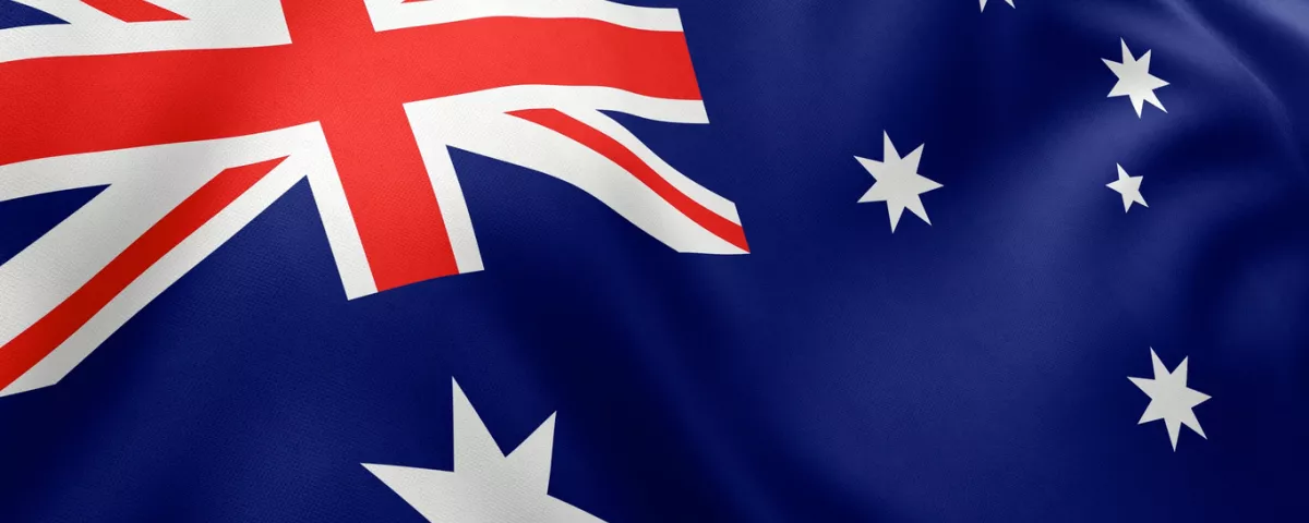 The Australian flag. A blue flag with the red and white crosses of the union Jack, the white Commonwealth star representing the states and territories and the 5 stars of the southern cross constellation