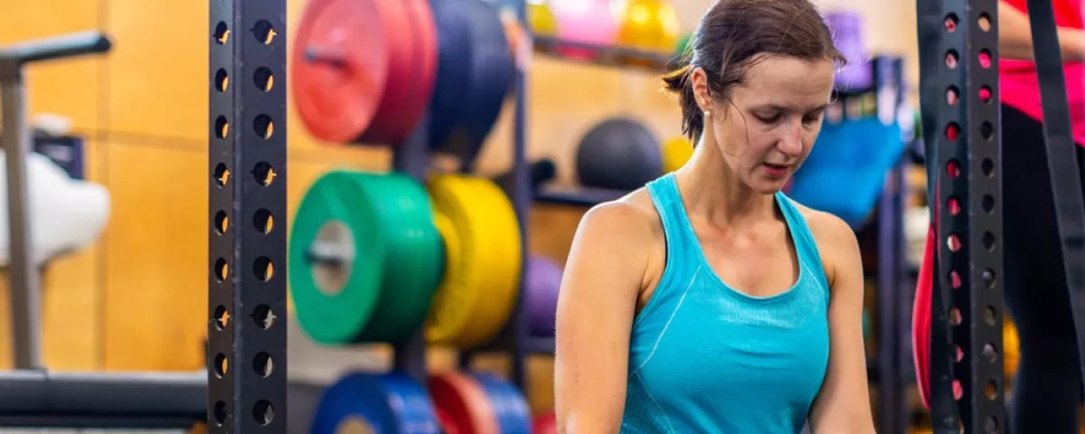 Woman stretching in a gym