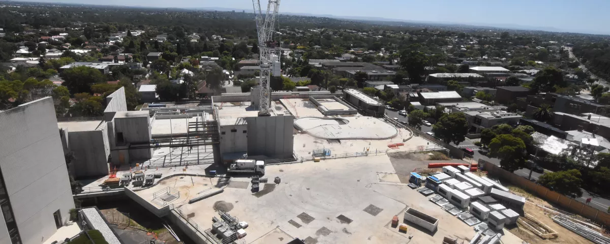 Construction site with new steel structure being installed