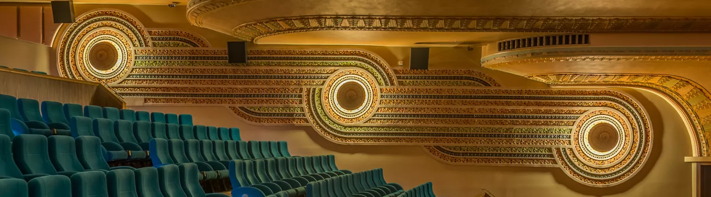 Blue seats in golden theatre