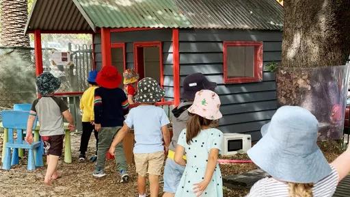 Children playing in the cubby at Cara Armstrong kindergarten