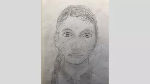 Self portrait by Zara, done with grey lead pencil on paper.