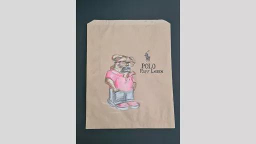 A drawing of a pug wearing a polo tshirt, slacks and reading glasses with the words 'Polo Ruff Lauren' next to it