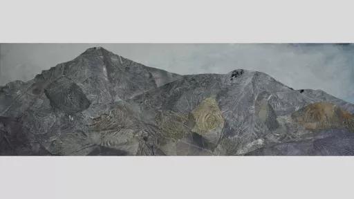 Collage of leaves make up a grey and mauve landscape against a cloudy sky