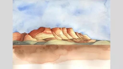 Landscape artwork created from watercolour. The image depicts a large mountain range in the distance. The sky is blue, the mountains are ochre, the hills in front of the mountains are green, and the land in the foreground is brown. 