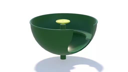 Computer-generated image of a tea cup shape with a side entry point and bench seat most of the way around the inside. There is a wheel in the centre to turn the cup