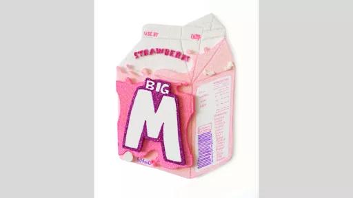 Glitter and markers on Paper presentation board artwork of a strawberry Big M milk carton