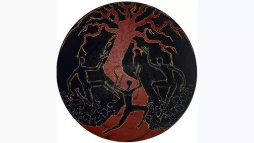 image of circular painting of a dark red tree surrounded by three black figures outlined in gold paint on a black background