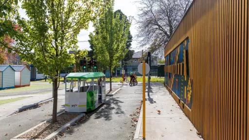 Children's sized tram between lanes of the road