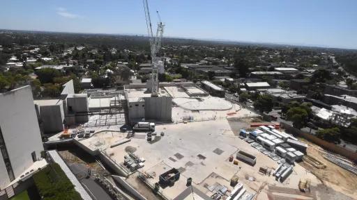 Construction site with new steel structure being installed