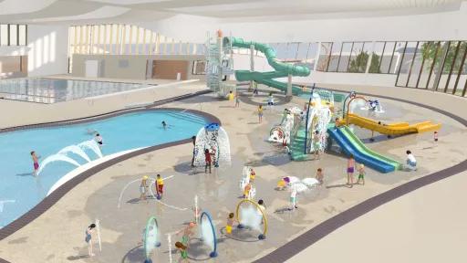 Artist render of a spacious indoor water play area with slides, sprays and small pool