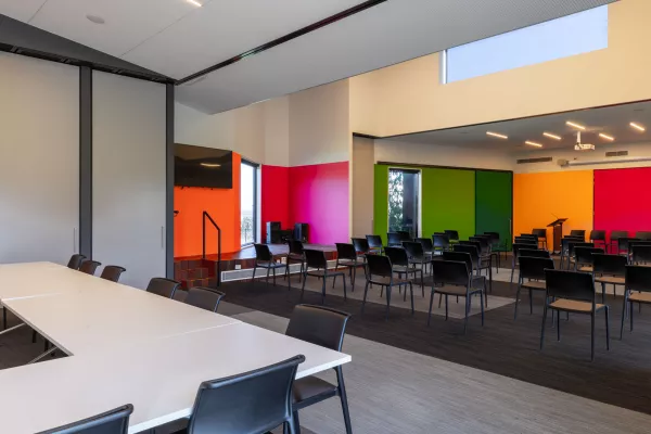 A large meeting room set up for two meetings